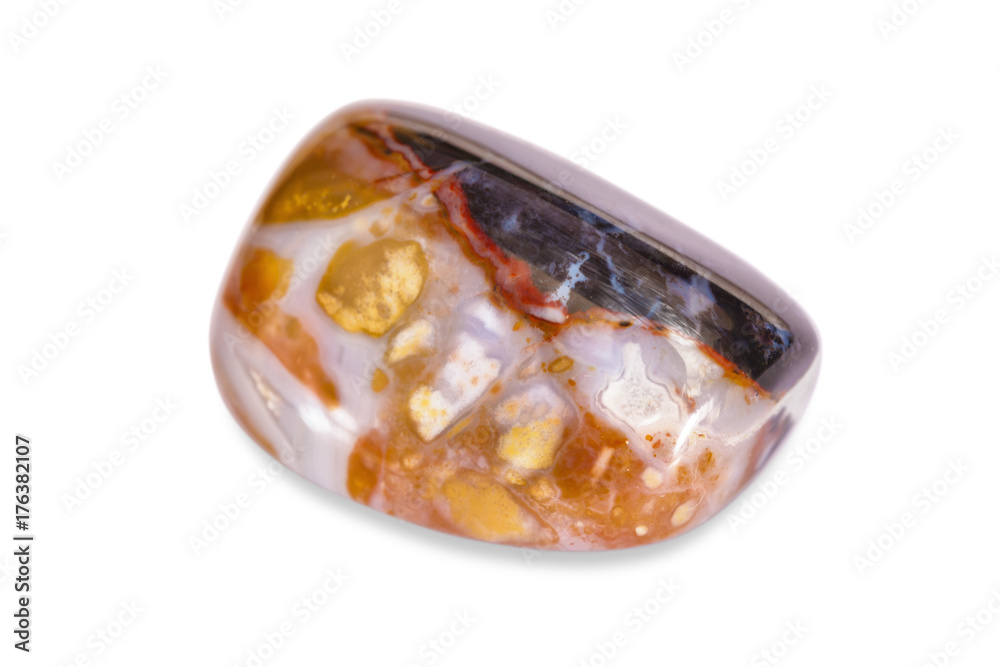 The semi-precious stone Jasper, polished, on a white background.