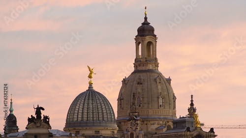 Illuminated skyline of Dresden in the evening light with the Frauenkirche, Hofkirche and excursion boats, Saxony, Jul, 2017