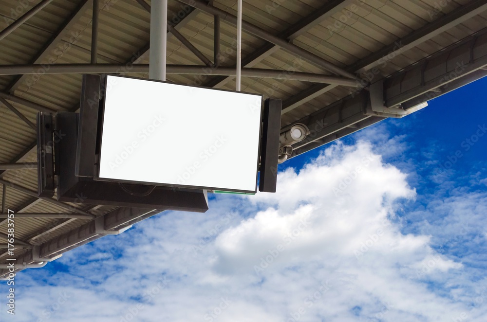 CCTV and LCD TV with white blank screen or billboard at under roof of sky train station, copy space for advertising or media and content with blue sky and cloud, commercial and marketing concept CCTV and LCD TV with white blank screen or billboard at under roof of sky train station, copy space for advertising or media and content with blue sky and cloud, commercial and marketing concept
