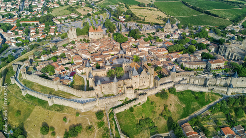 Fotografi Aerial top view of Carcassonne medieval city and fortress castle from above, Sou
