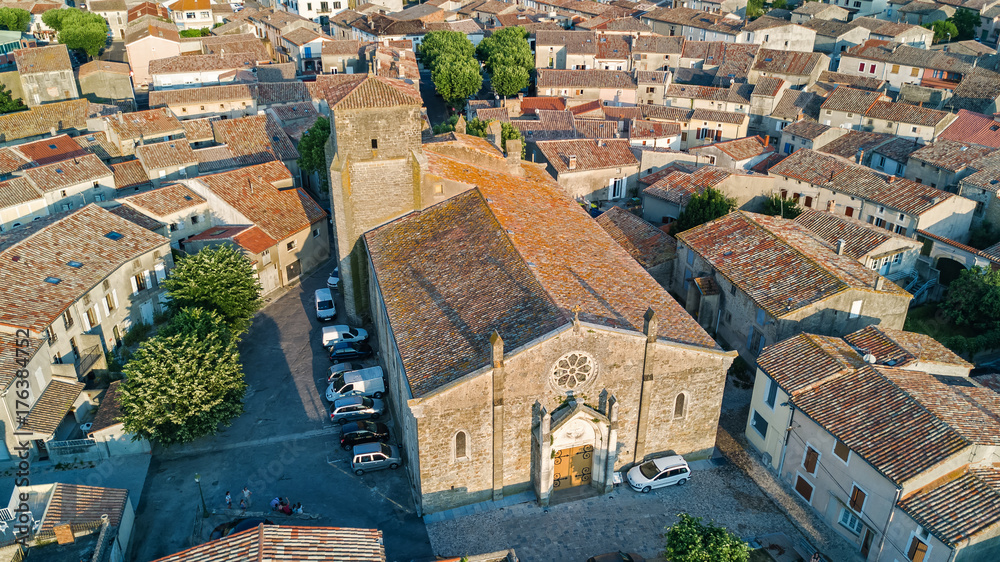 Fototapeta premium Aerial top view of Bram medieval village architecture and roofs from above, Southern France 