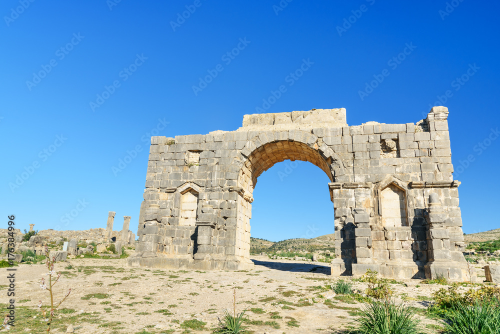 Arch of Caracalla in Roman ruins, ancient Roman city of Volubilis. Morocco