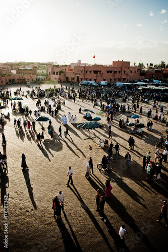 Shadows refleciting on the ground in the Marrakech Square photo