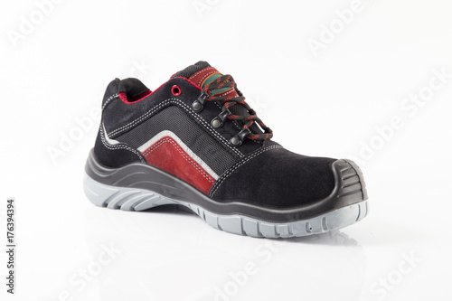 Male black and red leather shoe on white background, isolated product.
