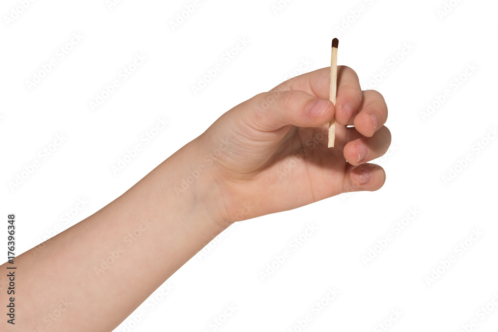 Hand of a child with a match isolated on a white background Hand of a child with a match isolated on a white background