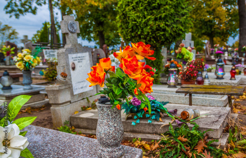 Graves on catholic cemetery. All Saints Day / All Hallows / 1st November.