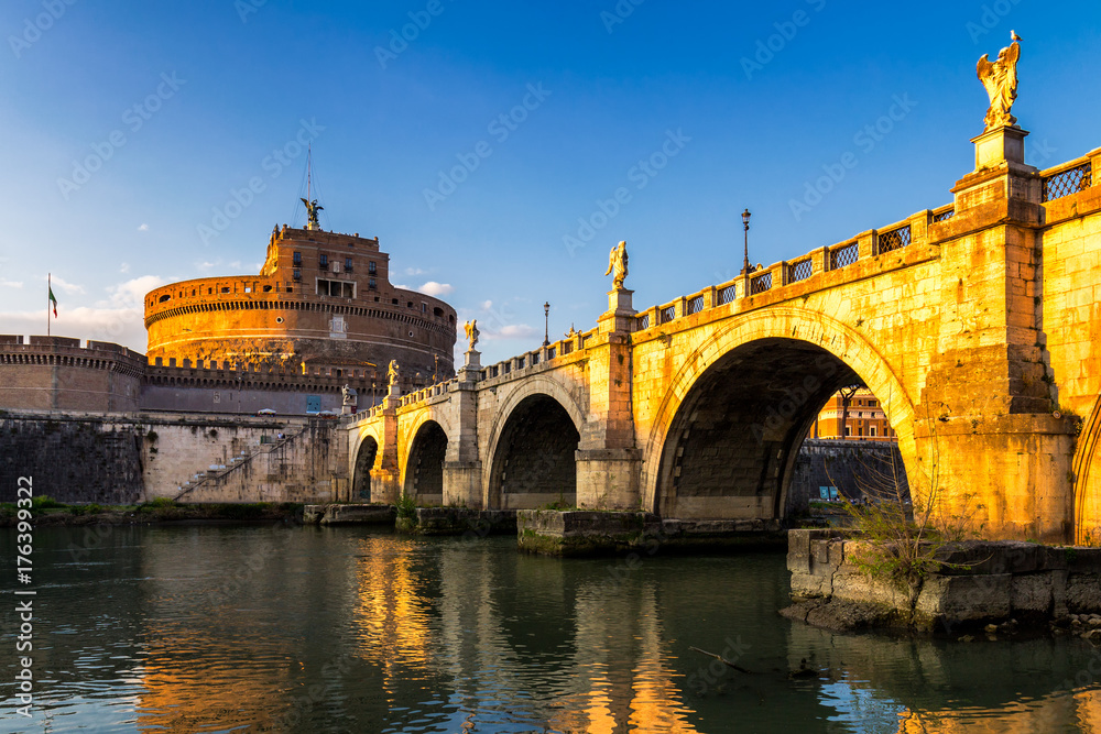 Rome, Italy. Ponte Sant Angelo, Castel Sant Angelo and Tiber River. Built by Hadrian emperor as mausoleum in 123AD ancient Roman Empire landmark.