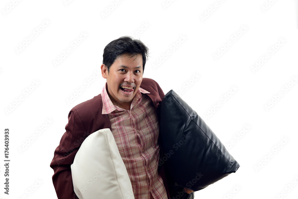 Asian crazy Businessman holding pillow and prepare go to bed isolate on white background Asian crazy Businessman holding pillow and prepare go to bed isolate on white background