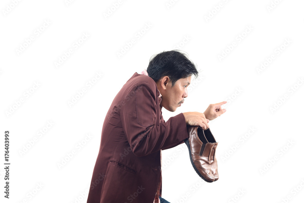 Crazy businessman holding shoes and try to sneak back in, do not get me wrong isolate on white background Crazy businessman holding shoes and try to sneak back in, do not get me wrong isolate on white background