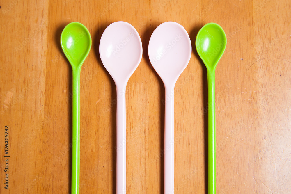 Cutlery spoon fork on the wood table in the kitchen Cutlery spoon fork on the wood table in the kitchen