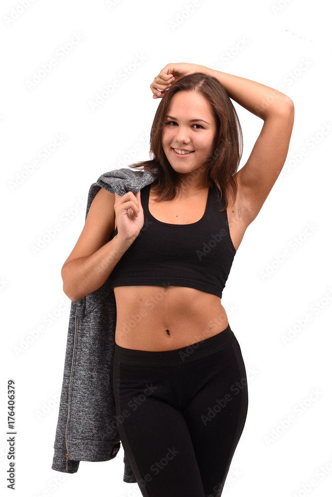 Fitness girl posing on white background isolated Fitness girl posing on white background isolated