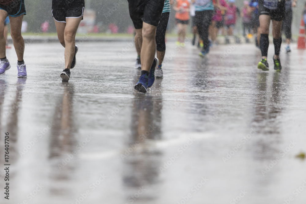 Marathon runners on the road the day it rained. Marathon runners on the road the day it rained.