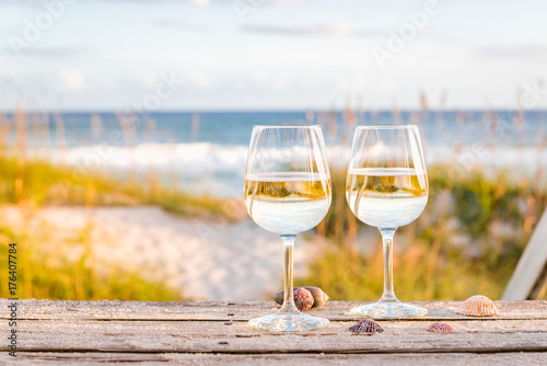 Wine at the beach with sea shells