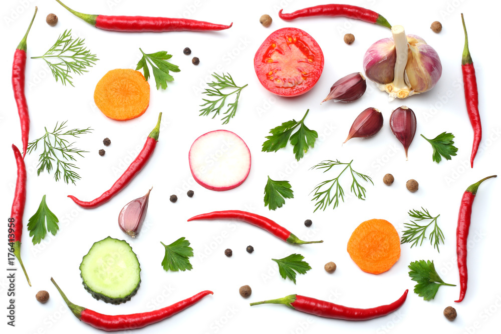 mix red hot chili peppers with parsley and sliced cucumber and garlic isolated on white background top view mix red hot chili peppers with parsley and sliced cucumber and garlic isolated on white background top view