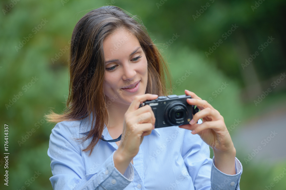 young female photographer with camera young female photographer with camera