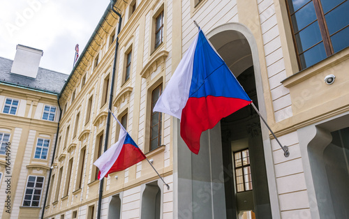 Photography National flags of the Czech Republic on the facade of the government building in