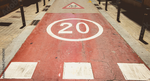 Photography in front of a pedestrian crossing, white paint forbidden to exceed the speed of