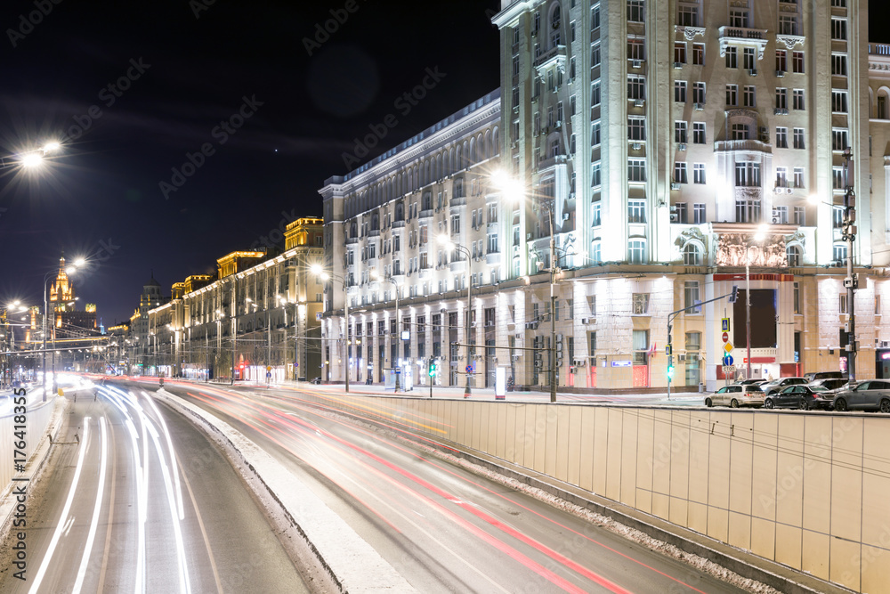 Fototapeta premium Triumph Square and transport metropolis, traffic blurry lights