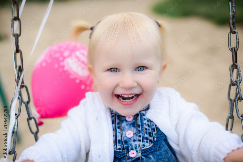 portrait of beautiful blonde little child girl with big blue eyes and a sweet smile portrait of beautiful blonde little child girl with big blue eyes and a sweet smile