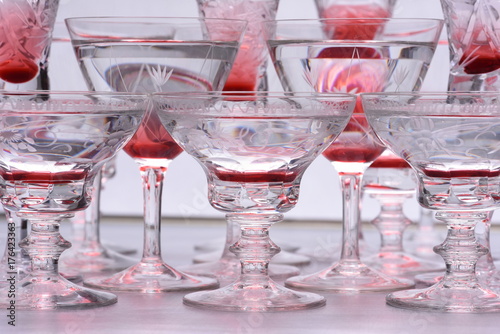 Closeup of drinking glasses with alcohol photo