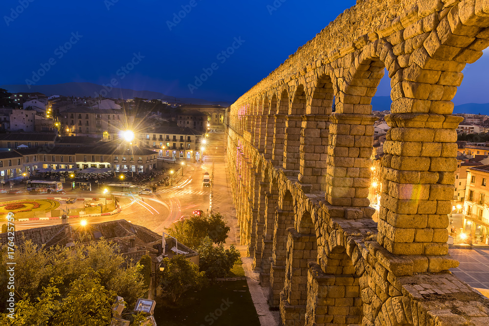Long exposure photography of Roman Segovia aqueduct at night in autonomous region of castile and leon. Declared World Heritage Site