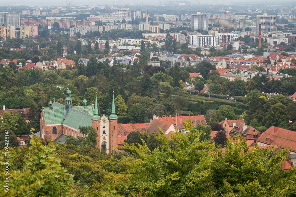 View of Oliwa Cathedral, Oliwa district and beyond in Gdansk, Poland, from above.