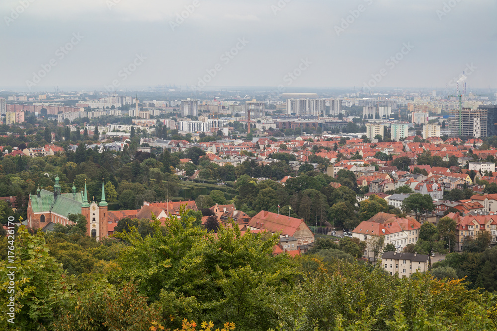 Oliwa district and beyond in Gdansk, Poland, viewed from above on a cloudy day.