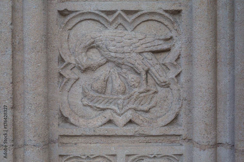 Carving of religious scene in stone of a church