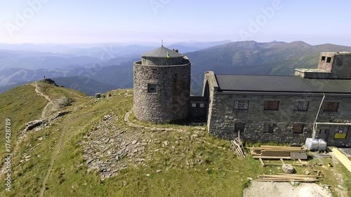 Aerial Drone Footage View: old abandoned observatory on mountains Pip Ivan. Carpathian, Ukraine, Europe. Majestic landscape. Beauty. photo