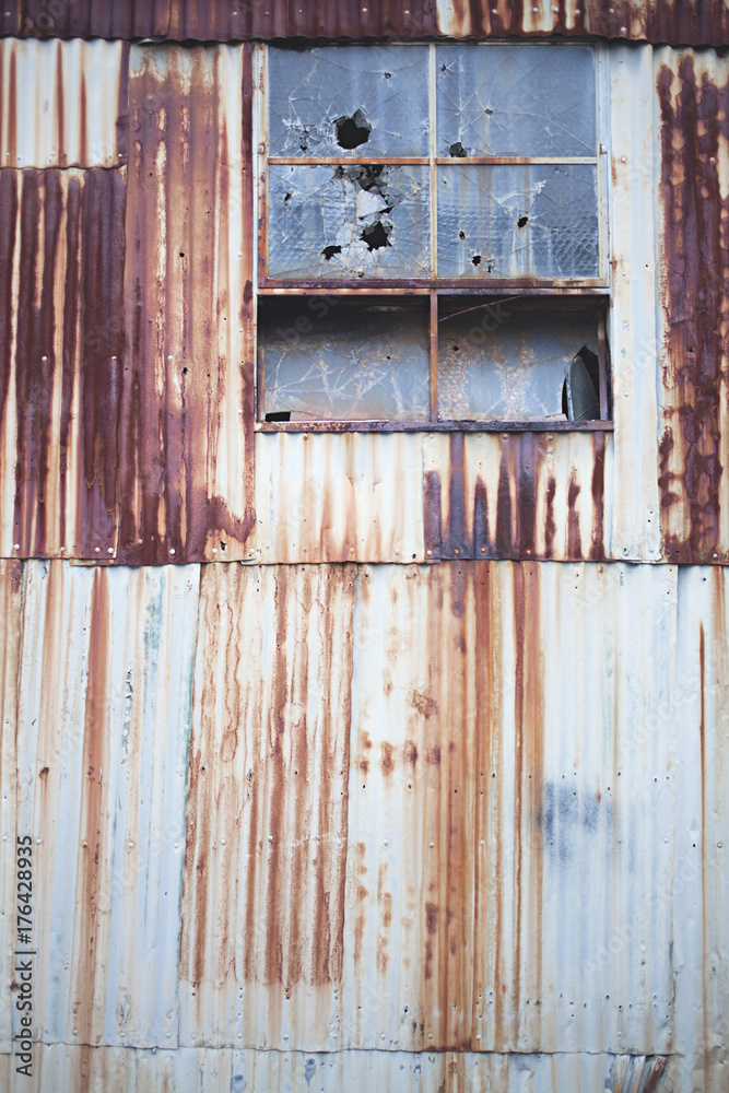 rusty corrugated tin textures on a fence and shed rusty corrugated tin textures on a fence and shed