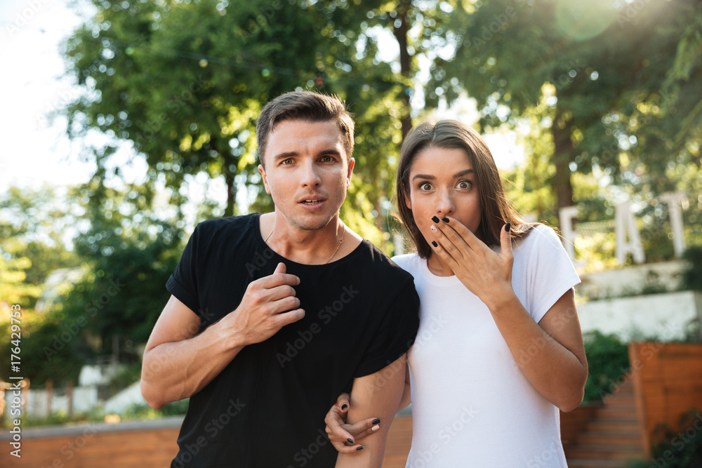 Fototapeta premium Portrait of a shocked young couple