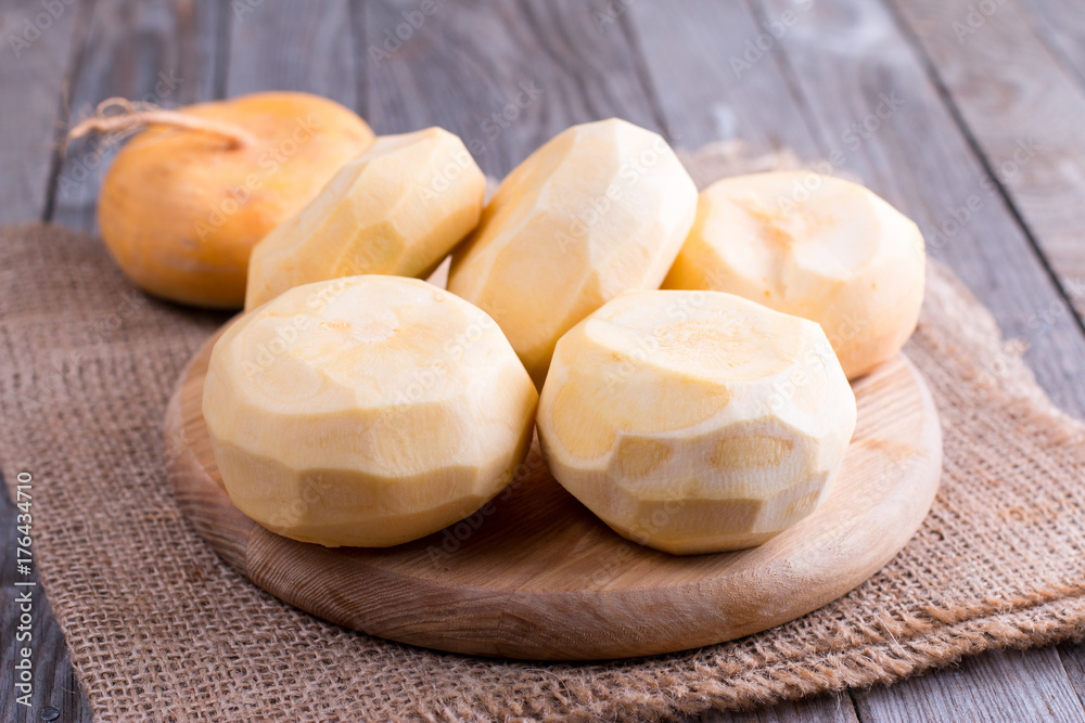 Purified turnips on a wooden table Purified turnips on a wooden table