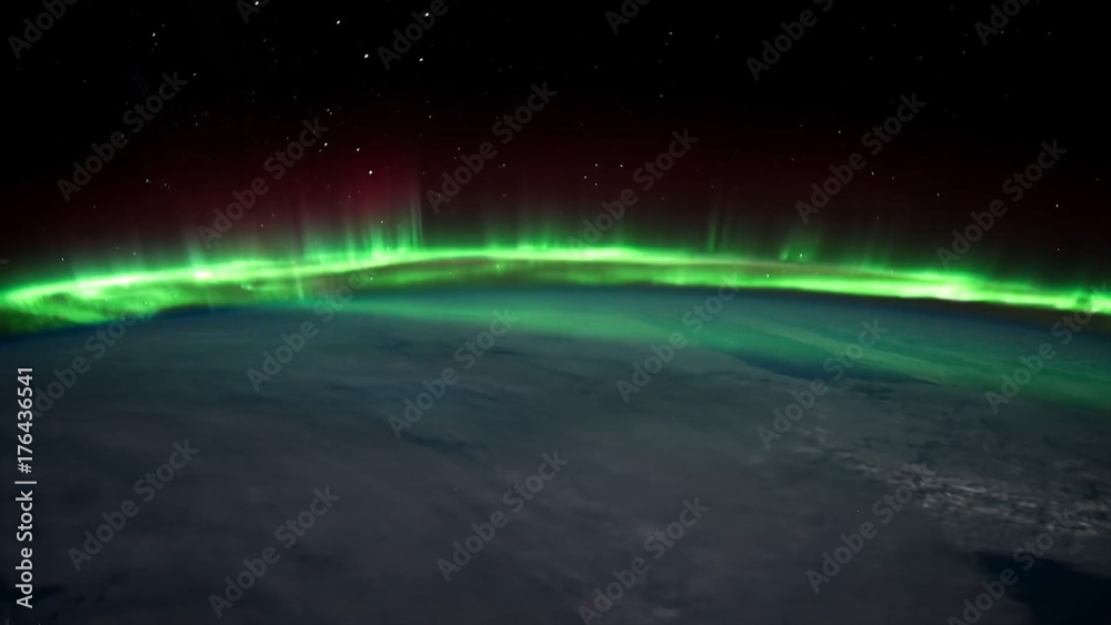 Northern lights view from space. Animation. Northern lights from the stratosphere. Northern Lights over lagoon in Iceland. Beautiful natural phenomenon Animation