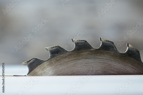 Teeth of a circular table saw blade in profile.