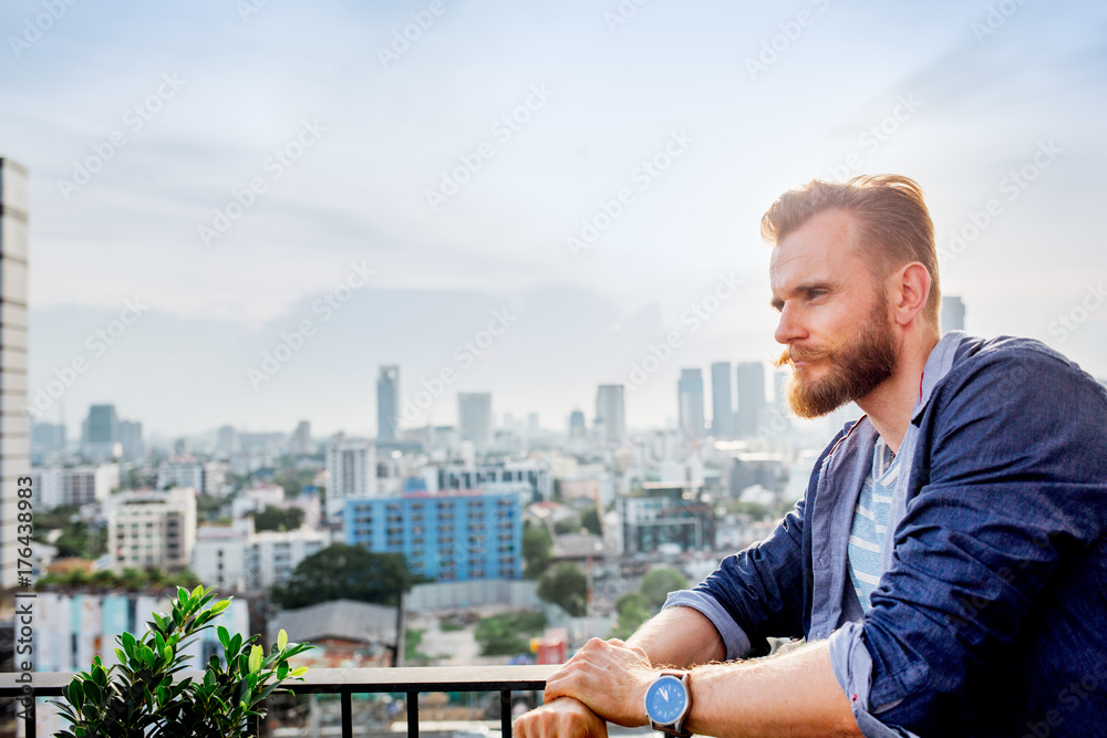 Handsome Bearded Man on a Balcony Handsome Bearded Man on a Balcony