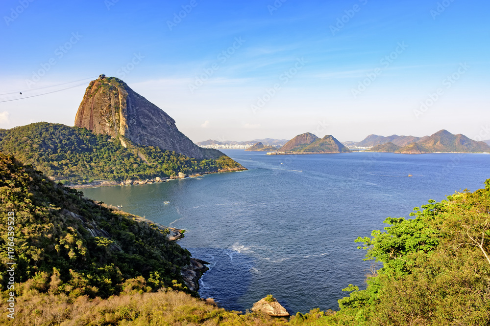 View of the Sugar loaf hill, Guanabara bay, sea, hills and mountains of Rio de Janeiro with the city of Niteroi in the background