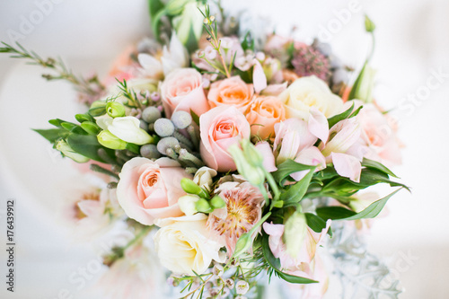 beautiful modern wedding bouquet on white table