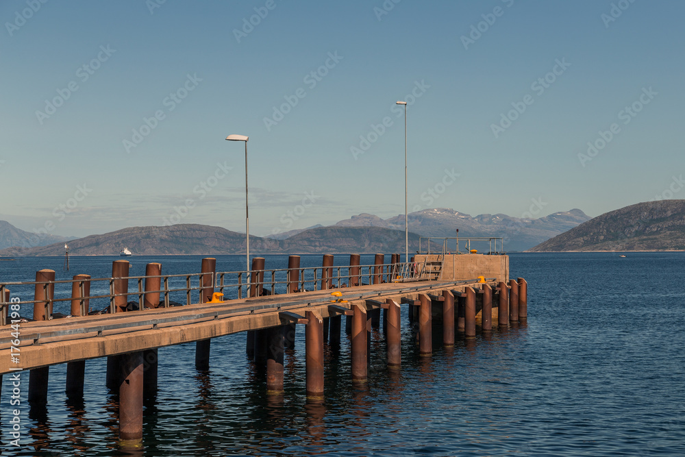 Lonely ferry pier in one fjord