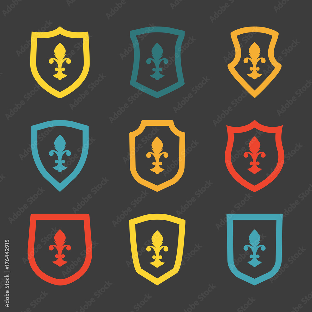 Shields icon set with fleur-de-lis symbol. Heraldic royal design. Vector illustration. Shields icon set with fleur-de-lis symbol. Heraldic royal design. Vector illustration.