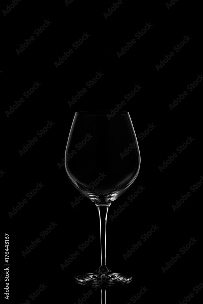 Red wine glass  on the dark background