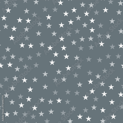 White stars seamless pattern on grey background. Awesome endless random scattered white stars festive pattern. Modern creative chaotic decor. Vector abstract illustration.