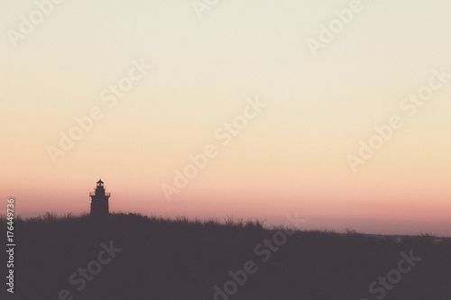 lighthouse sunset silhouette