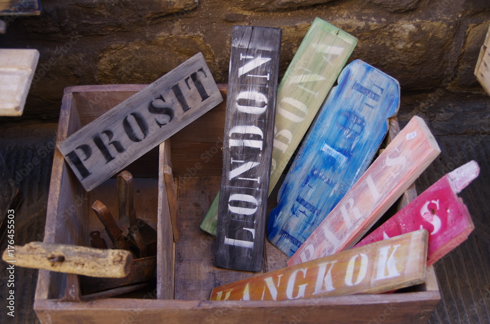 Vintage wooden colorful signs with name of cities