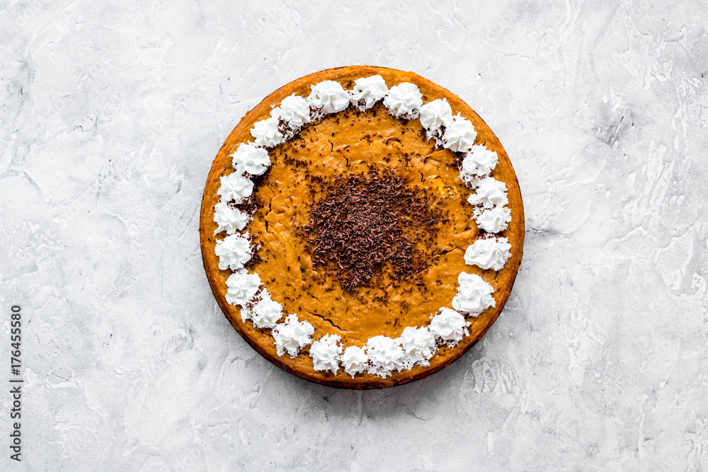 Pumpkin pie for thanksgiving day on stone background top view copyspace Pumpkin pie for thanksgiving day on stone background top view copyspace