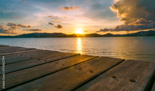 Landscape of paradise tropical island beach with empty wood bench, sunrise shot © morkdam