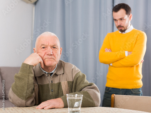 Old father and son serious talk