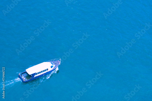 Aerial view of sailing boat at sea.