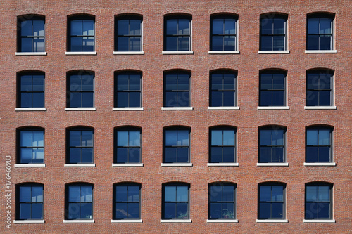  facade view of old brick wall building in the city