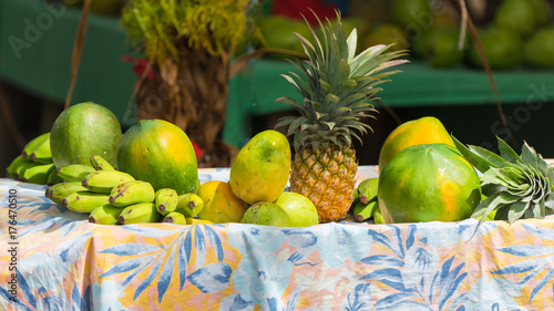 Fototapeta Naklejka Na Ścianę i Meble -  Exotic fruits sold on the road, market stall, street hawker in French Polynesia, Moorea 
