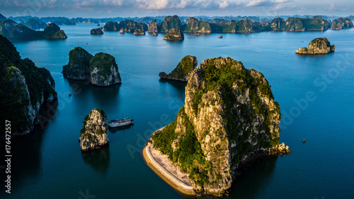 Ha Long Bay at the start of  new day with the sun rising photo